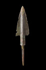 Western Asiatic/Aegan, ca. 1200-700 BC.
A bronze spearhead with a distinctive triangular-shaped blade that gracefully tapers to a sharply pointed apex...