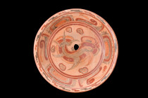 Ca. 600-900 AD.
A polychrome bowl featuring a circular flared rim and a shallow basin on a low foot, exuding an aura of graceful elegance. The vessel'...