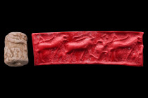 Likely Bactrian/Turkmenistan, ca. 2000 BC.
A cylinder seal, likely from Bactria. It depicts a human figure with a horse and an X-shaped star above it....