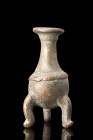 Ca. 1st millennium BC.
A cast bronze small vessel, designed for holding kohl with a globular lower body that gracefully extends into a long tubular ne...