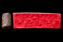 Ca. Early 2nd millennium BC.
A specked stone cylinder seal, likely from the Isin Larsa or Old Babylonian period, c. 1900-1600 BC. It seems to depict a...