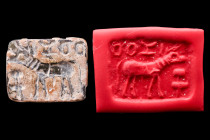 Ca. 3rd millennium BC.
A steatite stamp seal from the mature Harappan period (Indus Valley culture), depicting a mythical unicorn, an incense burner a...