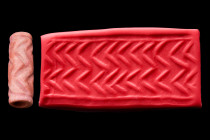 Ca. 3000 BC.
A pink stone cylinder seal with a pattern of two parallel rows of chevrons between upper and lower rulings. Good condition. Accompanied b...
