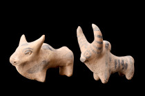 Ca. 3rd Millennium BC.
A pair of cream-coloured ceramic figurines of zebu bulls captures attention with their striking features. Each figurine is ador...