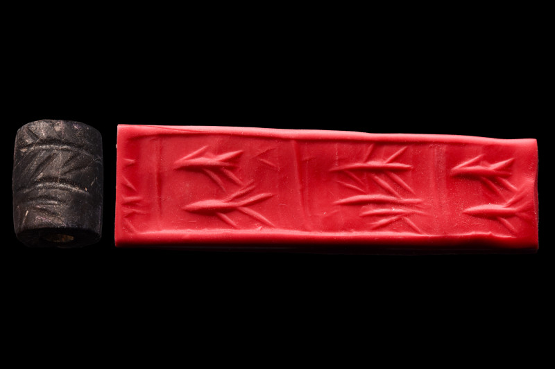 Ca. 3000 BC.
A black stone cylinder seal in a good condition. Two sections separ...
