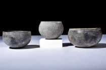 Ca. 3rd-2nd millennium BC.
An exceptional triad of Bactrian schist stone bowls. The first of these vessels assumes a hemispherical form, its surface i...