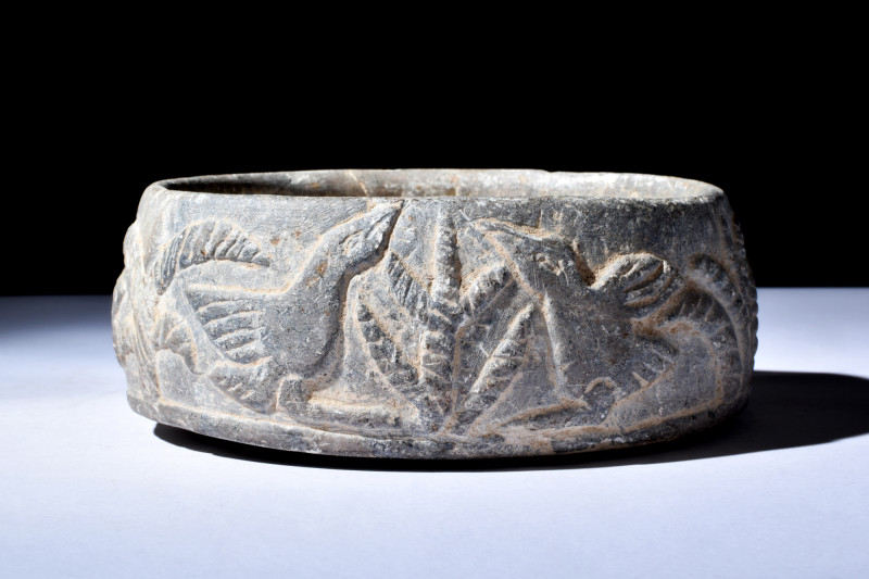Ca. 3rd-2nd millennium BC.
Crafted with meticulous intention, this vessel bears ...