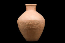 Ca. 2800-1900 BC.
A large terracotta jar, with impressed decoration to the mid to lower body, a slightly flaring neck with globular body. Impressed de...