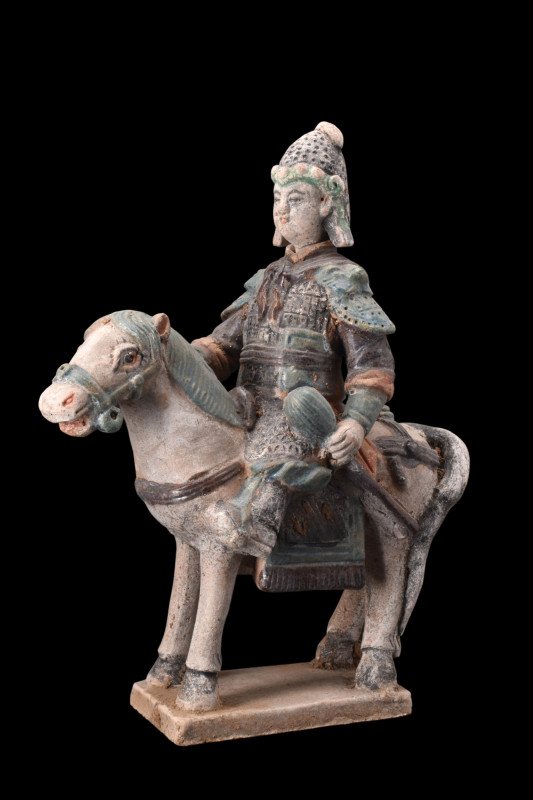 Ca. 1368-1644 AD, or later.
A pottery mingqi, portraying a horse and a valiant w...