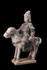 Ca. 1368-1644 AD, or later.
A pottery mingqi, portraying a horse and a valiant warrior rider adorning its back. The sculpture exhibits the horse stand...