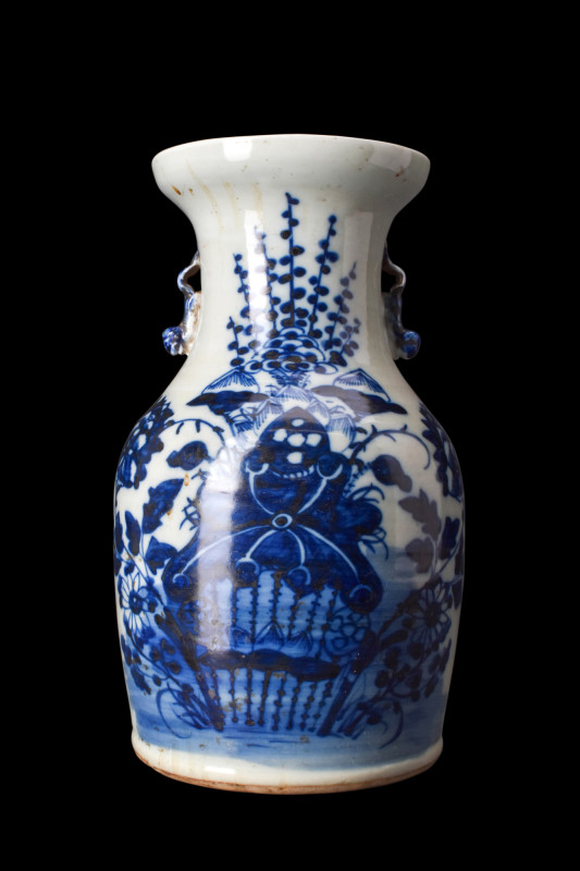 .
A celadon-ground underglaze-blue porcelain vase characterised by a squat lower...