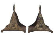 Ca. late 18th century AD.
A pair of stirrups either from Turkey or North Africa, decorated with gold inlay and turquoise. Condition: Very good with ex...