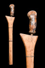 Indonesia, ca. 19th-20th century AD.
A kris dagger with an elegant and distinctive blade-patterning achieved through alternating laminations of iron a...