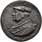 Schwarzach, Kloster. Abt Johann Gutbrot 1520-1548. Einseitige Bronzegussmedaille o.J. unsigniert. Brustbild des Abtes mit Kopfbedeckung nach links. 49...