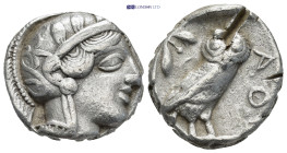 Attica, Athens AR Tetradrachm. (22mm, 16.9 g) c. 454-404. Head of Athena r., wearing earring, necklace, and crested Attic helmet decorated with three ...