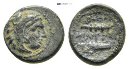 King Of Macedon Alexander III (336-323) AE 1.33 Gr. 10mm.
 Head of Heracles right, wearing lion’s skin headdress. 
Rev. ALEXANΔPOY, above, club, and b...
