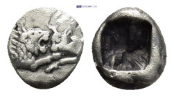 Kings of Lydia. Kroisos 560-546 BC. 1/12 Stater AR 0.43 Gr. 6mm.
 Confronted foreparts of lion and bull 
Rev. Incuse punch.