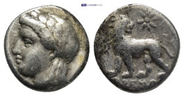 IONIA, Miletos. Circa 350-300 BC. AR Drachm (14mm, 3.40 g). Laureate head of Apollo left / Lion walking left, head turned back; monogram to left, star...