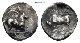 Ionia. Magnesia ad Maeander circa 350-325 BC. 1 Gr. 9mm.
 Horseman riding right 
Rev. Bull butting left, maeander below.
