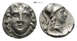 Pisidia, Selge, c. 250-190 BC. AR Obol (8mm, 0.91 g). Facing gorgoneion. R/ Helmeted head of Athena r.; behind neck, astragalos above uncertain symbol...