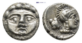 Pisidia. Selge circa 350-300 BC. Obol AR (15mm, 0.95 g) Gorgoneion / Head of Athena to right, wearing crested Attic helmet; behind, astragalos.