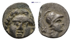 Pisidia. Selge circa 350-300 BC. Obol AR (9mm, 0.57 g) Gorgoneion / Head of Athena to right, wearing crested Attic helmet; behind, astragalos.