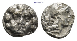 Pisidia. Selge circa 350-300 BC. Obol AR (9mm, 0.91 g) Gorgoneion / Head of Athena to right, wearing crested Attic helmet; behind, astragalos.