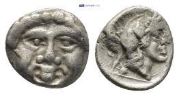 Pisidia. Selge circa 350-300 BC. Obol AR (9mm, 0.92 g) Gorgoneion / Head of Athena to right, wearing crested Attic helmet; behind, astragalos.