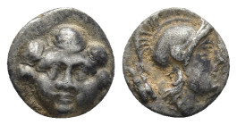 Pisidia. Selge circa 350-300 BC. Obol AR (9mm, 0.94 g) Gorgoneion. / Head of Athena to right, wearing crested Attic helmet; behind, astragalos.