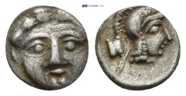 Pisidia. Selge circa 350-300 BC. Obol AR (9mm, 0.97 g) Gorgoneion / Head of Athena to right, wearing crested Attic helmet; behind, astragalos.