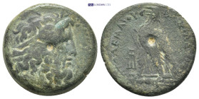 Ptolemaic Kingdom. Ptolemy II Philadelphos (285-246 BC) AE 10 Gr. 23mm.
 Head of Zeus Ammon right. 
Rev. Eagle standing left on thunderbolt; club in l...