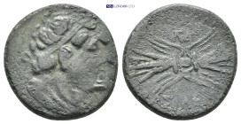 Ptolemaic Kingdom. Ptolemy II Philadelphos. 285-246 B.C. AE Kyrene. 5.73 Gr. 20mm.
Diademed bust of Ptolemy I right, wearing aegis 
Rev. Winged thunde...