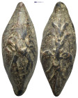 Lead sling bullet. Circa 4th century BC. PB sling bullet (37mm, 35.8 g). Thunderbolt design on one side, scorpion on the other.