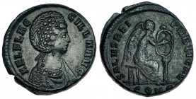 AELIA FLACCILLA, esposa de Teodosio I. AE-22. Constantinopla (383 a.C.). A/ AEL FLACCILLA AVG. R/ La Victoria sentada a der. inscribiendo un cristogra...