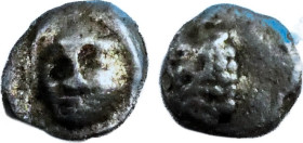 Caria, Heratomnos
AR Tetartemorion, circa 392-376 BC, 7 mm, .13 g,