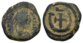 Byzantine bronze coin (2.75 Gr. 16mm.)