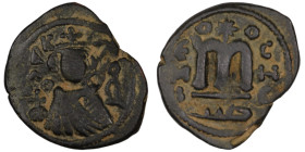 Arab-Byzantine. (685-692 AD) Fals. (21mm, 3,97g). Emesa. Obv: facing imperial bust holding globus cruciger. Rev: M.
