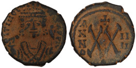 Tiberius II. Constantine. (578-582 AD). 1/2 Follis / 20 Nummi. (21mm, 5,86g) Constantinople. Obv: cuirassed bust facing holding globus cruciger. Rev: ...