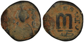 Arab-Byzantine. (685-692 AD) Fals. (20mm, 4,73g). Emesa. Obv: facing imperial bust holding globus cruciger. Rev: M.