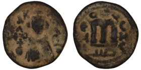 Arab-Byzantine. (685-692 AD) Fals. (21mm, 4,52g). Emesa. Obv: facing imperial bust holding globus cruciger. Rev: M.
