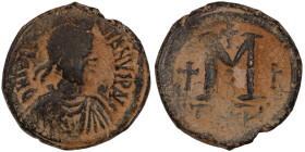 Justinian I. (527-565 AD) Follis. (30mm, 17,20g) Theoupolis. Obv: D N IVSTINIANVS PP AVI. diademed bust right. Rev: M between stars, cross above.