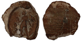 ancient seal impression. sealing wax. (14mm, 0,85g) figure standing left.