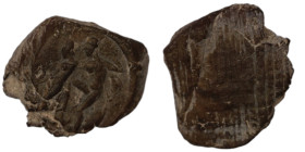 ancient seal impression. sealing wax. (14mm, 0,97g) figure standing left.