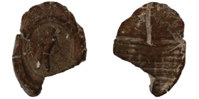 ancient seal impression. sealing wax. (17mm, 0,46g) figure standing left.