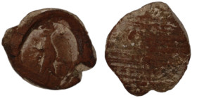 ancient seal impression. sealing wax. (13mm, 0,52g) figure standing left.