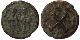 Phocas and Leonitia. (602-610 AD). 10 nummis. (16mm, 2,00g) Constantinople. Obv: Phocas and Leonitia sitting on throne facing. Rev: X A/N/N/O.