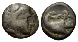 Italy, Bruttium, Kroton. c. 350-300 BC. Æ (14,5mm, 3g). Head of Herakles right, wearing lion skin. R/ Eagle right, alighting on snake; ivy leaf to lef...
