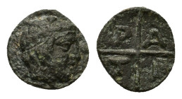 Macedon, Tragilos, c. 405-390 BC. Æ (9,2mm, 0.7g). Head of Hermes to right, wearing petasos. R/T-P-A-I within four segments around central pellet. AMN...