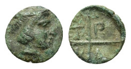 Macedon, Tragilos, c. 405-390 BC. Æ (9mm, 0,6g). Head of Hermes to right, wearing petasos 
R/T-P-A-I within four segments around central pellet. AMNG ...