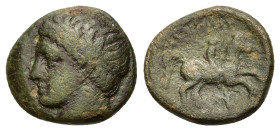 Kings of Macedon. Philip II (359-336 BC). Æ Unit (17,2mm, 5.7g). Uncertain Macedonian mint. Head of Apollo left, hair bound in tainia. R/ naked youth ...